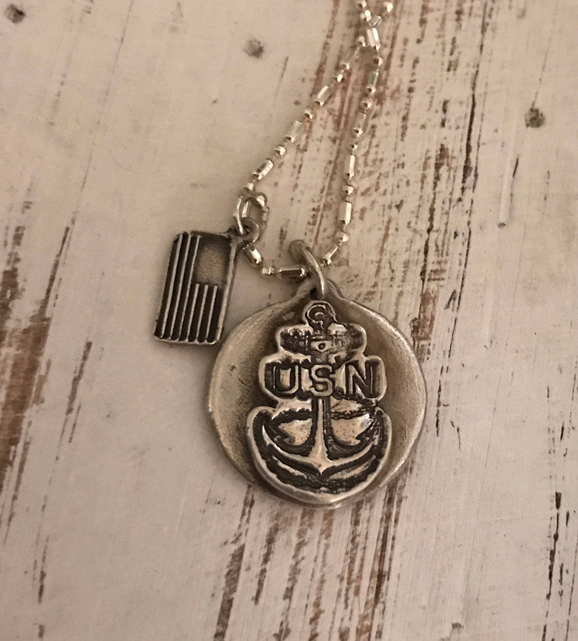 Silver pendant with green stone