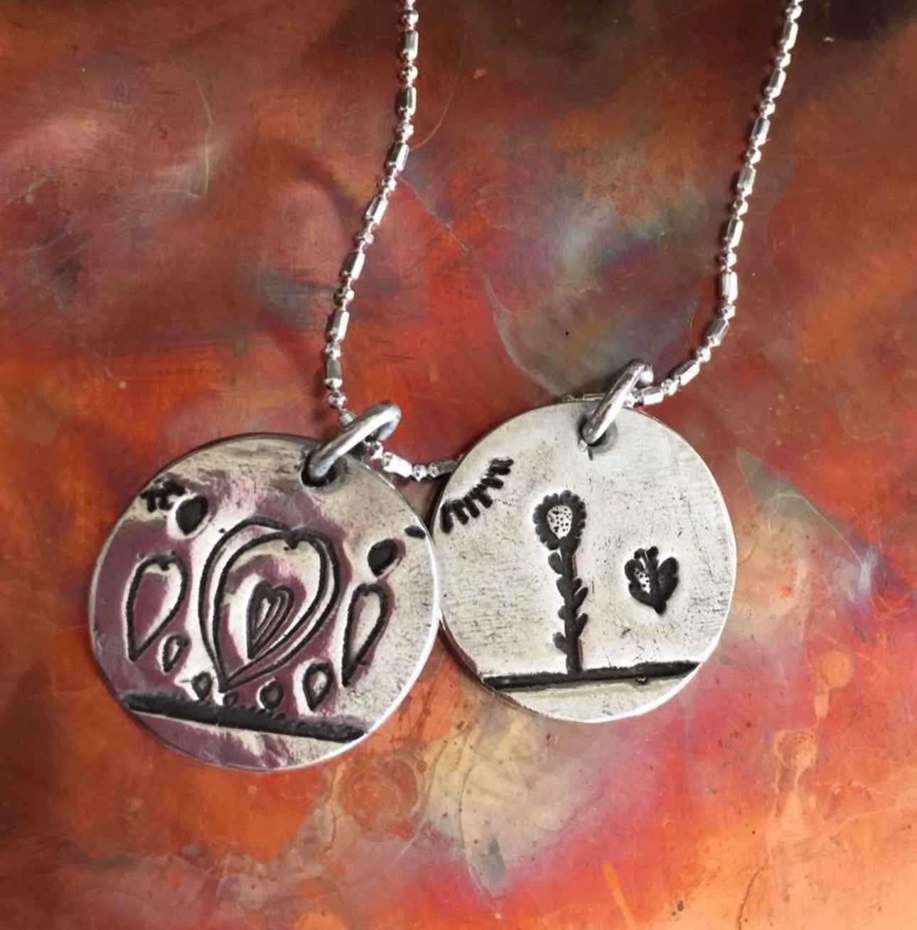 Silver charm pendant necklace